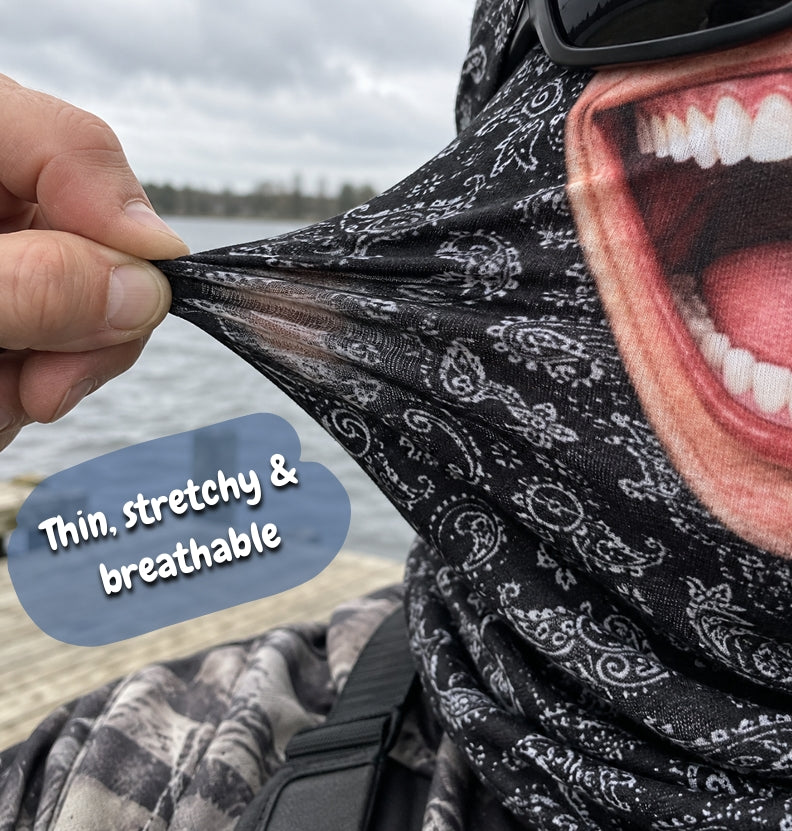 Close-up of the thin, stretchy Grinwear balaclava fabric with black paisley print